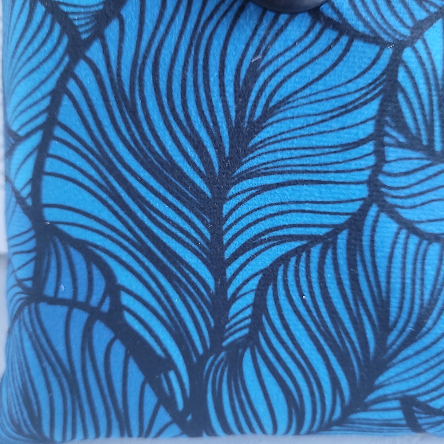 Blue fabric book sleeve with pocket