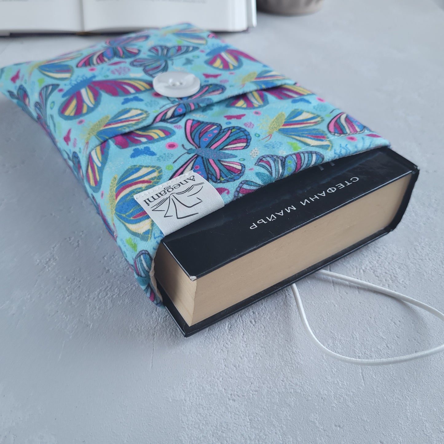 Pochette de livre en tissu papillon avec poche