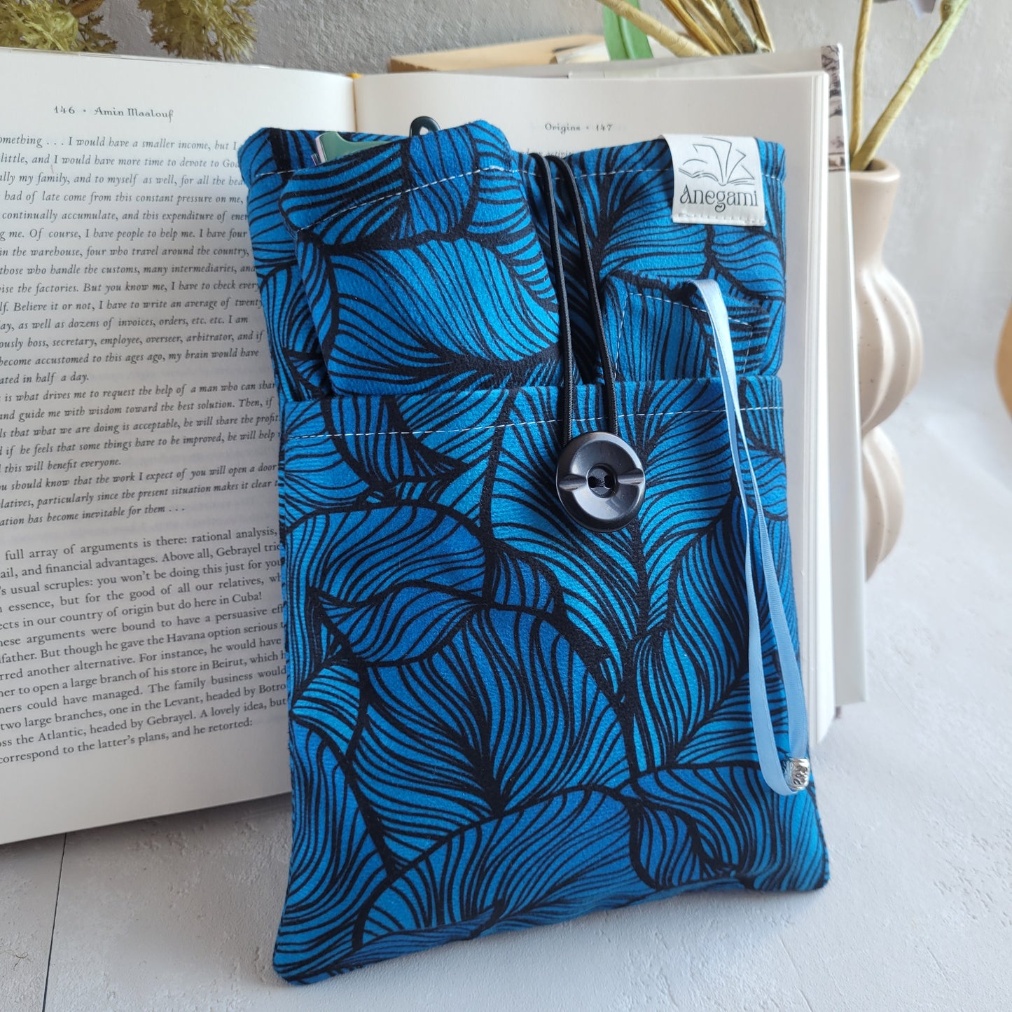 Elegante set regalo libresco, custodia imbottita per libri con tasca e segnalibro in tessuto con nappa