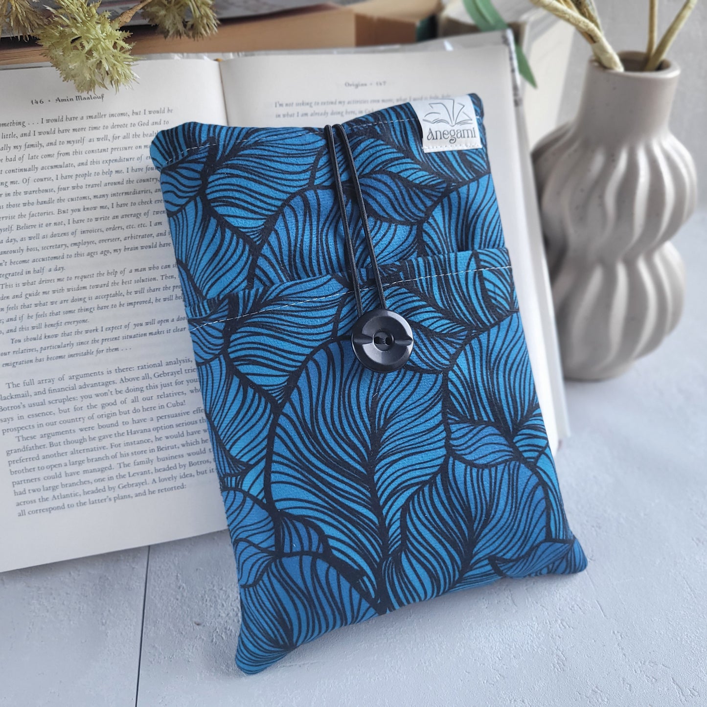 Blue fabric book sleeve with pocket