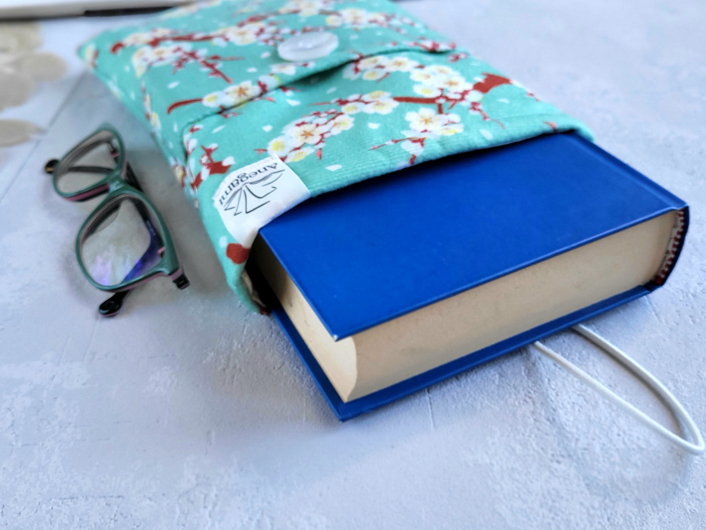 Green Cherry Blossom fabric book sleeve with pocket