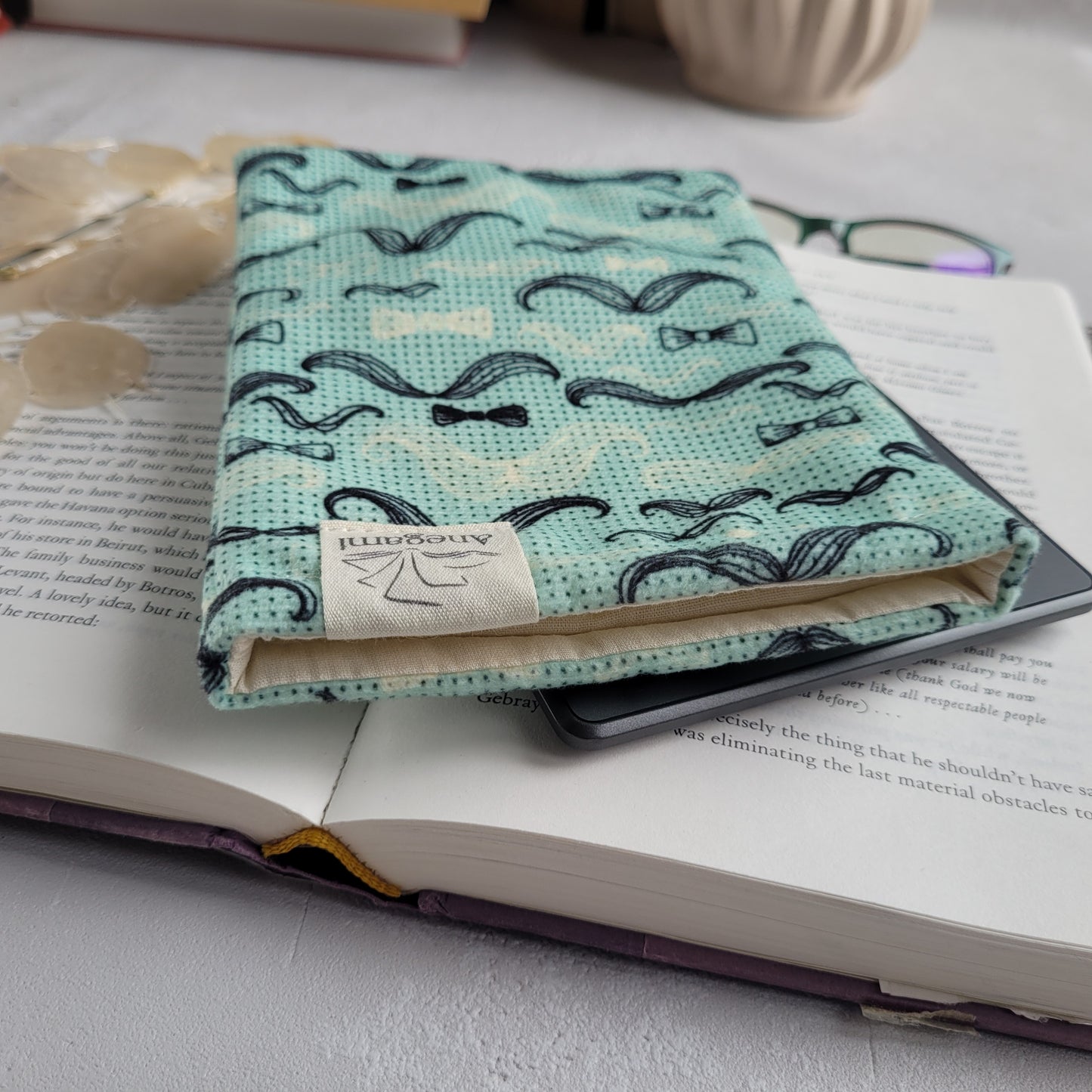 Moustache Kindle sleeve padded with foam and cotton lining